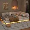 A modern bedroom with a white sectional bed featuring LED lighting and a patterned rug. Produktbild-Vorschau