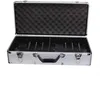 An open silver carrying case with black foam lining and compartments for electronic devices. Náhled obrázku produktu