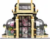 A Lego-style building of a botanical garden with glass domes and flowers. Anteprima dell’immagine prodotto