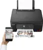 A hand holding a smartphone displays a document next to a Canon printer that is printing a document. Produktbild-Vorschau