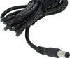 A close-up shot of a black power cord with a circular connector. Produktbild-Vorschau
