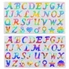 Two rows of resin alphabet and symbol molds. Produktbild-Vorschau