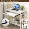 A white desk with a laptop, keyboard, mouse, and decorative items, with inset diagrams showing ergonomic posture. Anteprima dell’immagine prodotto