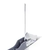 A close-up view of a silicone joint tool with a metal blade. Produktbild-Vorschau