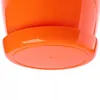 Close-up view of the bottom of an orange plastic plant pot and its saucer. Podgląd zdjęcia produktu