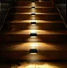 Outdoor wooden stairs illuminated by solar-powered LED lights. Produktbild-Vorschau