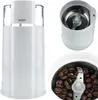 A collage of images showing a white electric coffee grinder from different angles, including a close-up of the grinding chamber with coffee beans. Podgląd zdjęcia produktu