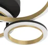 A close-up view of a modern, abstract ceiling light fixture with intertwined rings. Produktbild-Vorschau