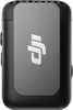 A close-up studio shot of a black DJI Mic 2 transmitter. Náhled obrázku produktu