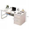 A white computer desk with a laptop, headphones, and books, with dimensions indicated by numbers. Podgląd zdjęcia produktu