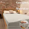 A bed with a fitted sheet, pillows, and a brick wall background. Text overlays provide product information. Produktbild-Vorschau