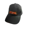 A black baseball cap with the orange STIHL logo embroidered on the front, isolated on a white background. Anteprima dell’immagine prodotto