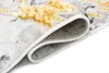 A close-up view of a rug, showing its texture and folded edge. Produktbild-Vorschau