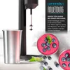A product shot of a silver milkshake cup next to a black milkshake machine, with two berry smoothies in glasses in the foreground. Náhľad obrázku produktu