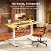 A modern home office setup with a standing desk, computer, and chair. Produktbild-Vorschau
