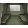 Interior view of a tent with two sleeping cots. Anteprima dell’immagine prodotto