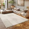 A modern living room with a large sectional sofa and a rug. Produktbild-Vorschau