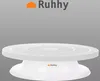 A white cake turntable with the brand logo visible on the base and at the top of the image. Anteprima dell’immagine prodotto