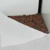 A close-up view of a corner of an aquarium or terrarium, showing a white fleece material partially covering a layer of brown and gray gravel. Anteprima dell’immagine prodotto