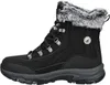 A side view of a black winter boot with fur trim. Voir les images du produit