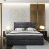 A luxurious bedroom setting with a large bed as the focal point. Produktbild-Vorschau