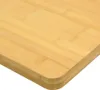 A close-up view of a bamboo cutting board. Produktbild-Vorschau