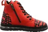A single red boot with black accents is shown against a white background. Produktbild-Vorschau
