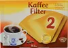 A box of coffee filters with a cup of coffee and coffee beans. Náhľad obrázku produktu