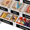 A close-up view of a toy grocery store display shelf with various toy food items and bottles. Náhľad obrázku produktu