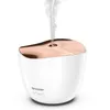 A white ultrasonic aroma diffuser with a rose gold top, emitting a stream of mist. Produktbild-Vorschau