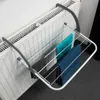 A radiator drying rack with towels hanging on it. Podgląd zdjęcia produktu