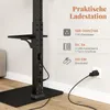 A close-up view of the charging station integrated into a TV stand, showing power outlets and USB ports. Podgląd zdjęcia produktu