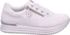 A white women's sneaker with a platform sole and a side zipper, shown from the side against a white background. Voir les images du produit