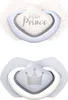 Two baby pacifiers are shown against a white background. The top pacifier has a white shield with small gray dots and the words "little Prince" printed in gray. The bottom pacifier has a light blue shield with a gray crown graphic. Produktbild-Vorschau