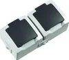 A close-up, studio shot of two connected electrical outlets with black covers. Anteprima dell’immagine prodotto