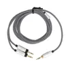 A black and white braided audio cable with two 3.5mm male connectors on one end and one 3.5mm male connector on the other. Náhled obrázku produktu