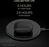 A black wireless charging pad with a pair of black earbuds on top, with text highlighting battery life. Produktbild-Vorschau