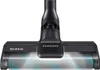 Close-up of a vacuum cleaner head with LED lights illuminated. Produktbild-Vorschau
