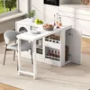 A white kitchen island with a drop-leaf table extension, a chair, and various kitchen items like bottles and jars. Produktbild-Vorschau