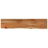 A top-down view of a wooden table top with a live edge. Voir les images du produit