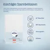 A white baby crib sheet is shown with marketing text and feature icons. Produktbild-Vorschau