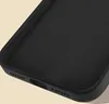 A close-up view of the interior of a black phone case, showing the textured lining and the bottom edge with speaker cutouts and a charging port. Produktbild-Vorschau