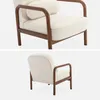 Two views of a cream-colored armchair with a wooden frame. Produktbild-Vorschau