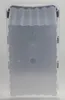 The image shows the bottom view of a transparent storage box with a wavy edge. Voir les images du produit
