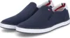 A pair of navy blue slip-on sneakers with white soles. Náhled obrázku produktu