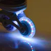 Close-up of illuminated inline skate wheels. Podgląd zdjęcia produktu