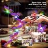 A collage of images showing a butterfly solar wind chime, a gift being exchanged, a mother and child, a wedding party, and a birthday celebration. Produktbild-Vorschau