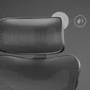 Close-up view of the headrest and upper back of an ergonomic office chair. Anteprima dell’immagine prodotto