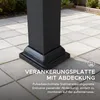 Close-up of a black metal post base with text overlay. Náhled obrázku produktu
