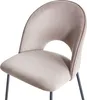 A close-up view of a taupe velvet chair with black metal legs. Náhľad obrázku produktu